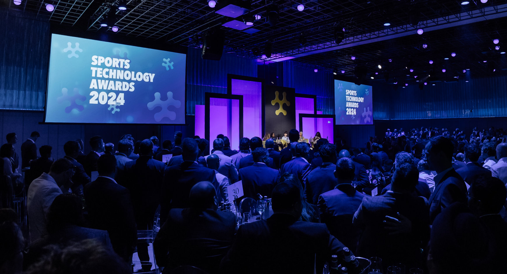 Sports Technology Awards STA Awards Ceremony Crowded Audience Stage Spotlights tech-led innovation sports tech